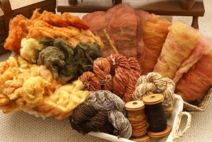A basket of naturally-dyed fibres, batts and yarn, hand-dyed by Debbie Tomkies. You can find more on the DT Craft & Design facebook page