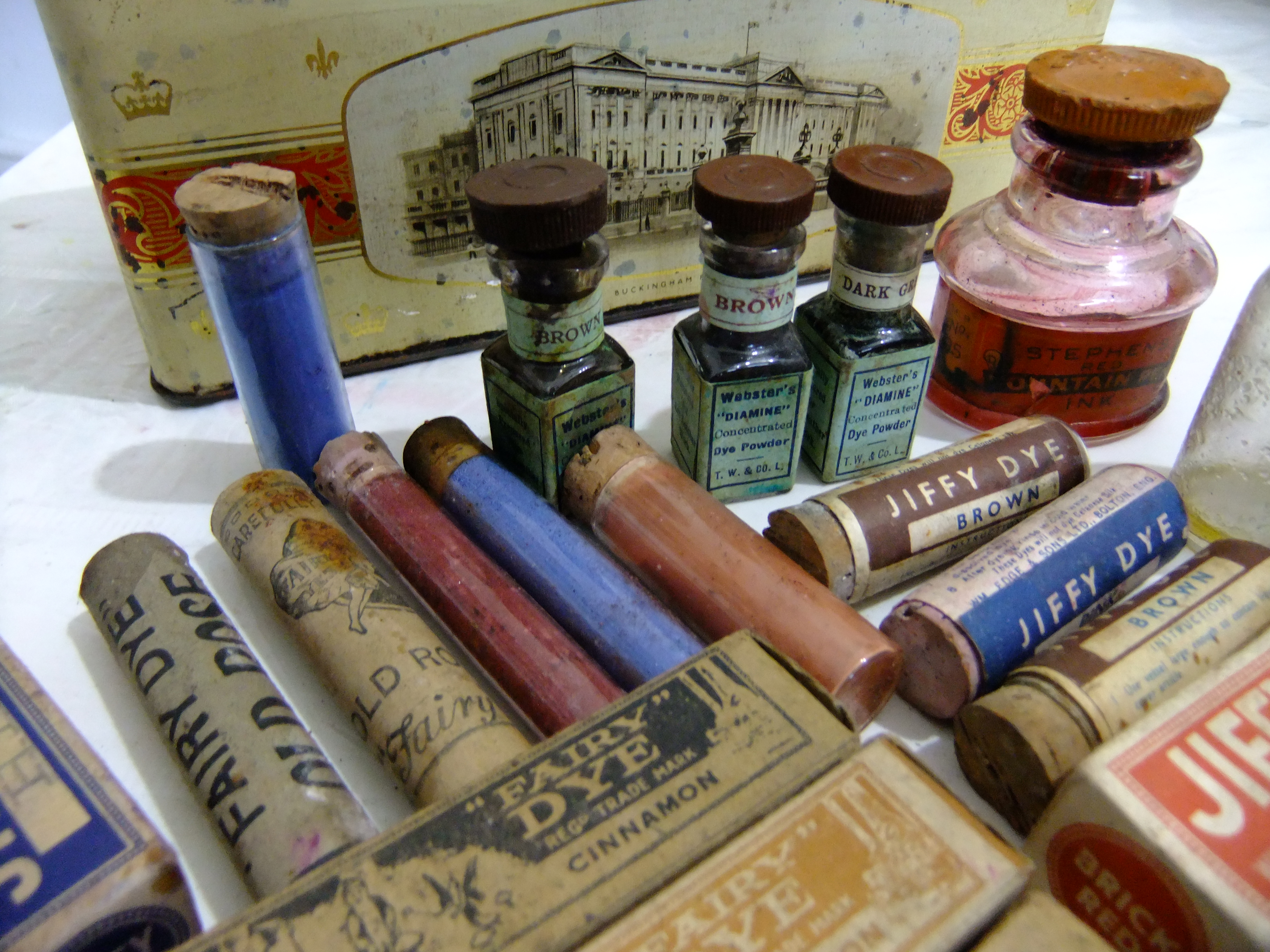 historical dye research - bottles and tubes of historical synthetic dyes