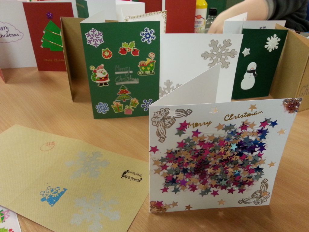 Salford Young Carers make gifts for the 42nd street pop-up shop project with Debbie Tomkies of Making Futures